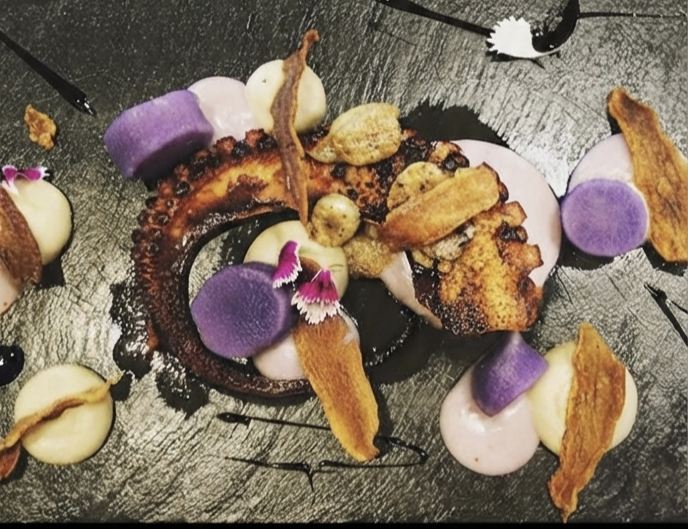 Charred octopus dish plated by Christian Wybaux