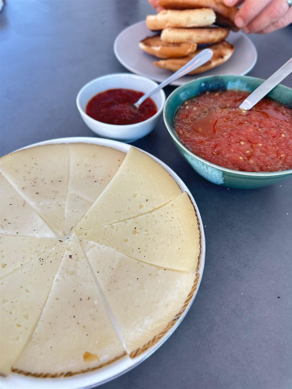 Spanish manchego cheese with pan con tomate for a villa breakfast